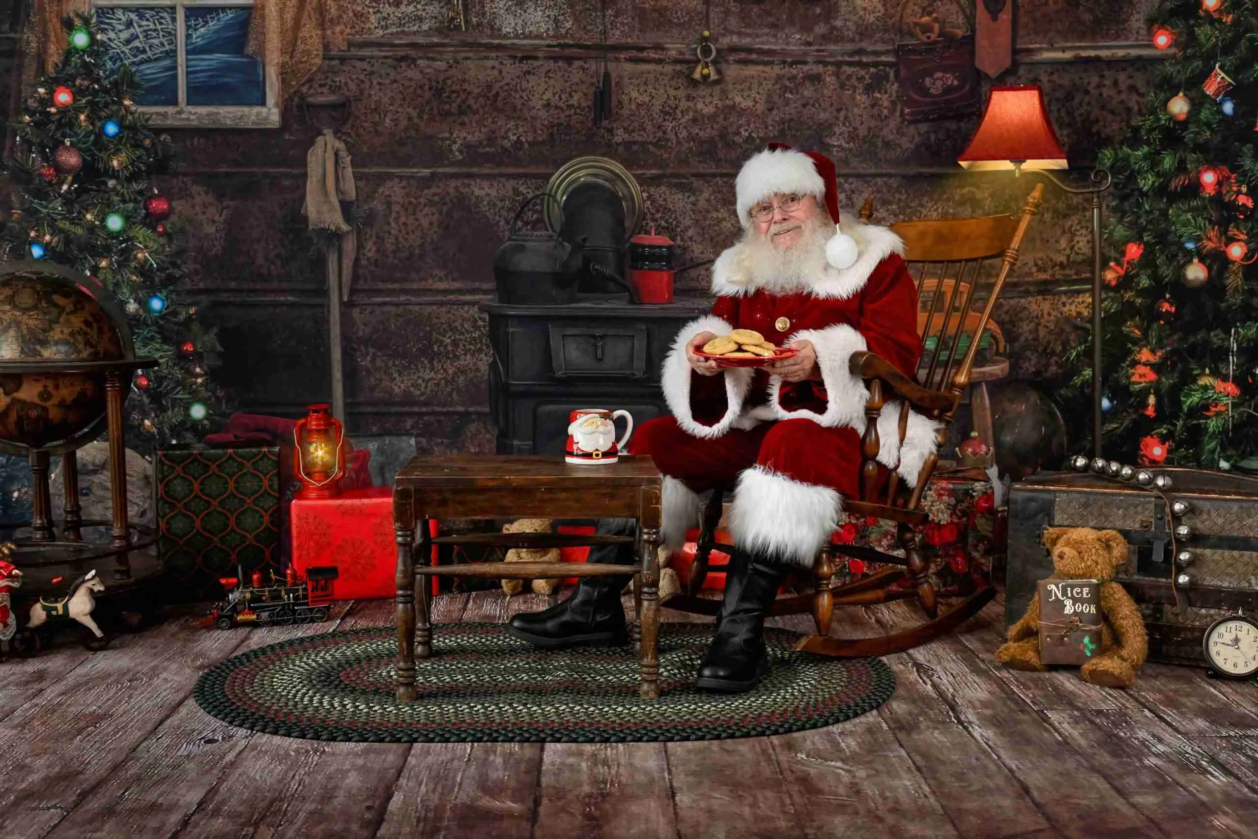 Santa Oliver sharing milk and cookies in a Christmas setting